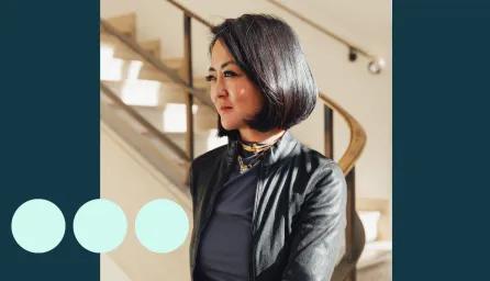 Image of woman with short black hair from side profile 