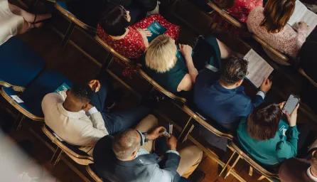 People sat in rows at an event