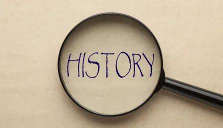 magnifying glass with the word 'History' written in the middle