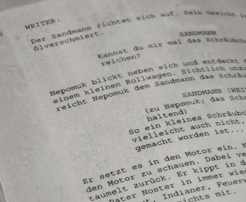 A close up of pages of script.