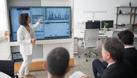 A dashboard presentation to a group of people