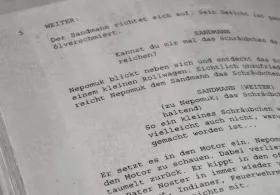 A close up of pages of script.