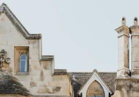 Architecture of Cambridge with blue sky behind