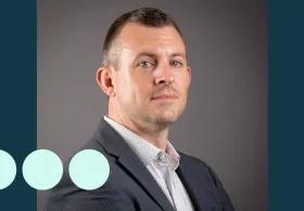 Headshot of man, looking directly at camera