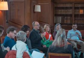 People in group speaking to eachother