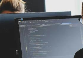 man looking at computer screen