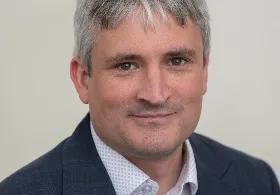 Dr Christopher Huggins