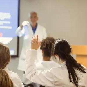 Clinician presenting to students