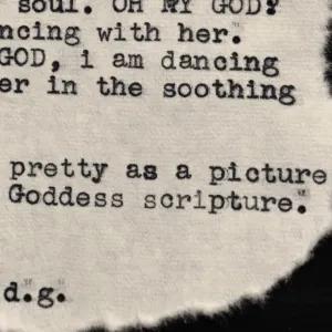 a piece of text, likely a poem or short verse, printed or typed on a torn or irregularly shaped piece of fabric, possibly linen or cotton. 