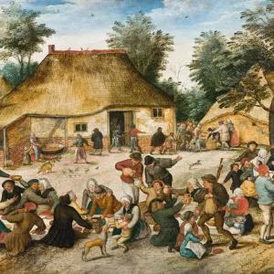 An oil painting depicting a lively 17th-century Flemish peasant wedding celebration with numerous figures eating, drinking, dancing, and socializing in front of thatched-roof buildings and trees.