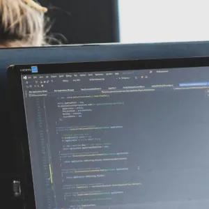 man looking at computer screen