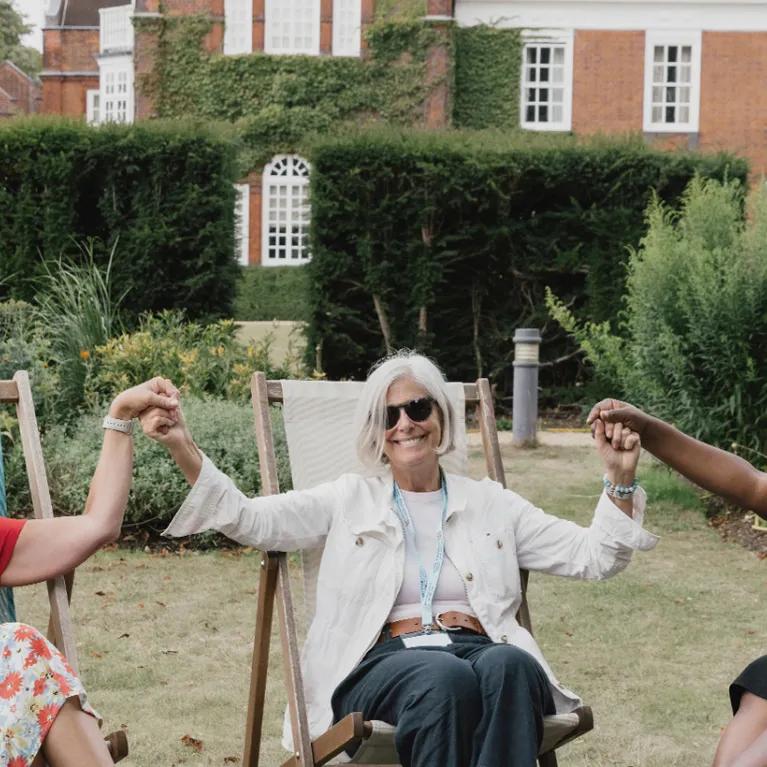 Three summer programme students enjoying an event