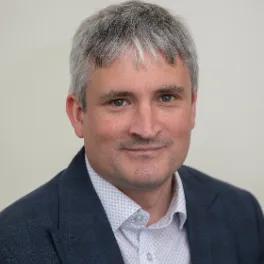 Dr Christopher Huggins
