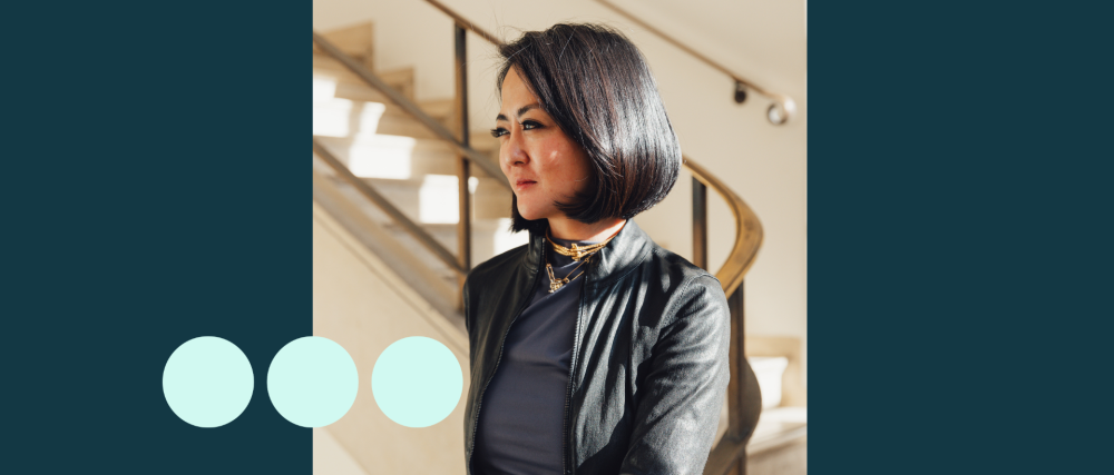 Image of woman with short black hair from side profile 